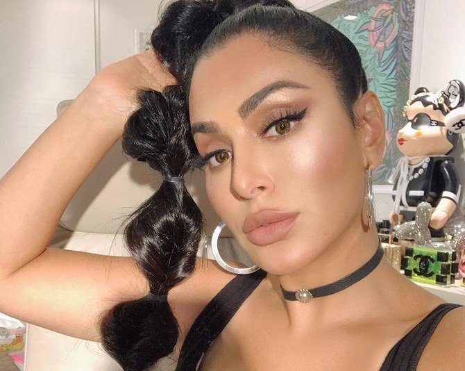 Popular beauty influencer: "Huda Kattan"